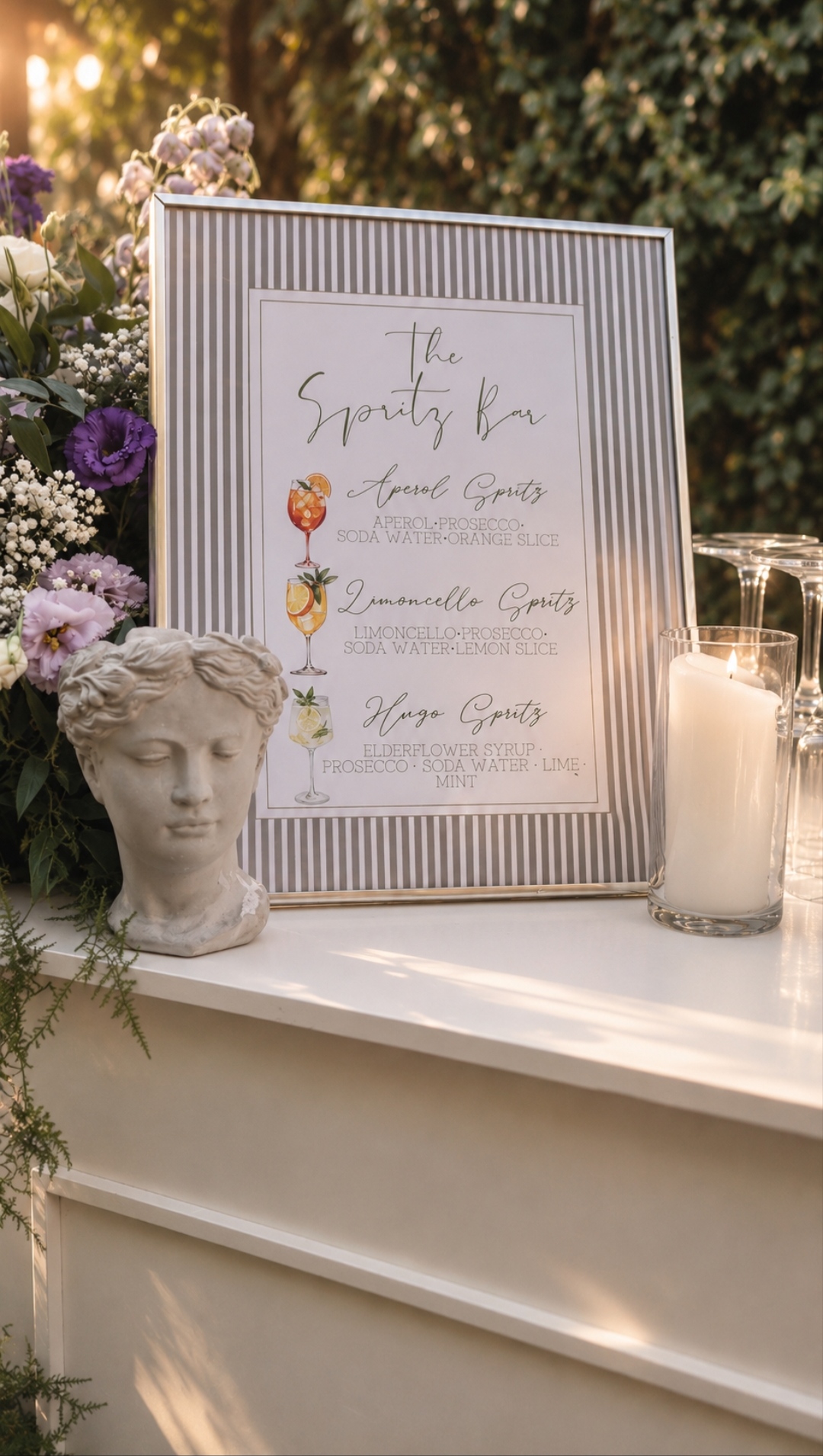 The Spritz Bar sign with plaster bust, flowers and candles