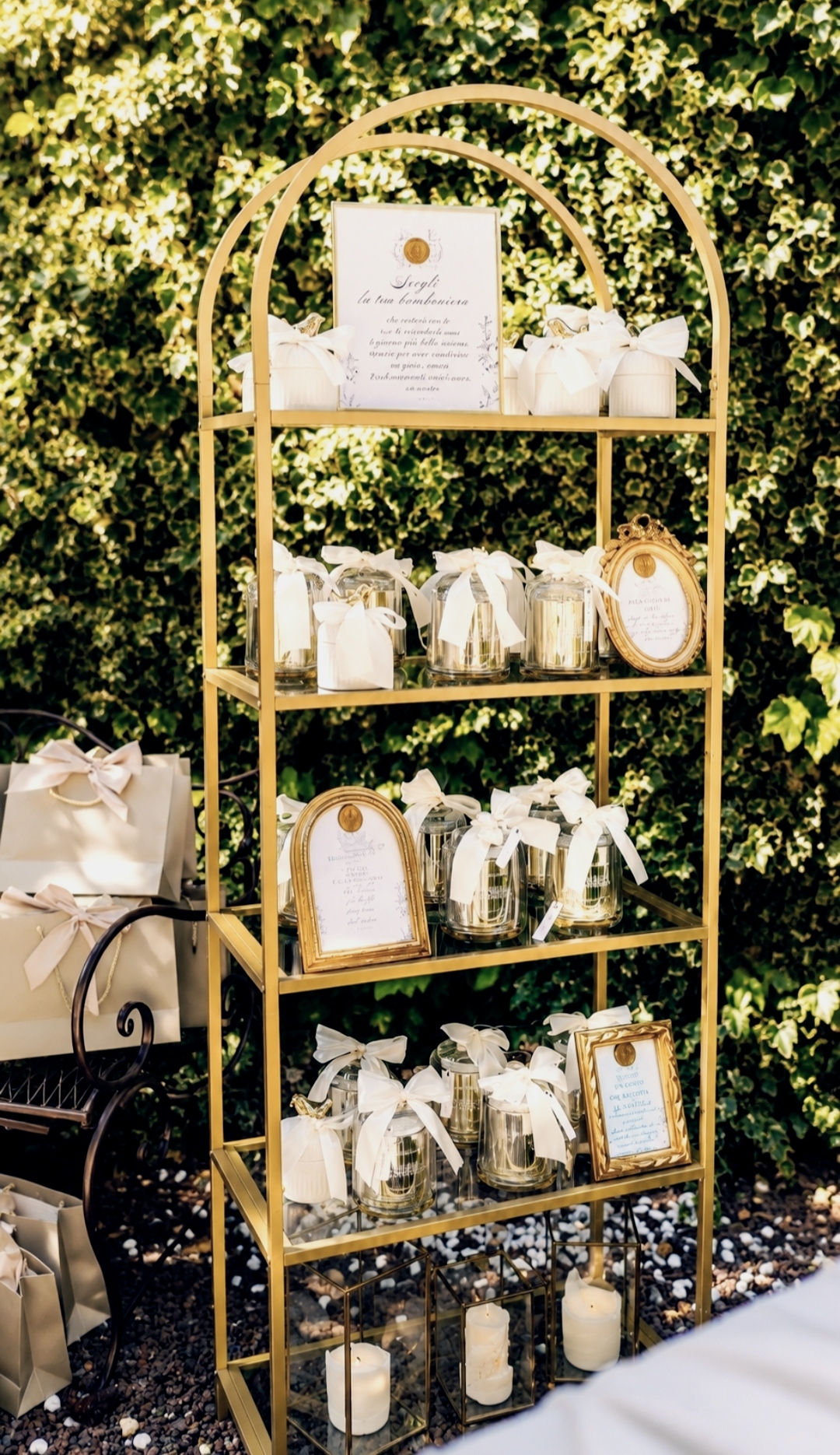 Favours display on a gilded stand in the garden