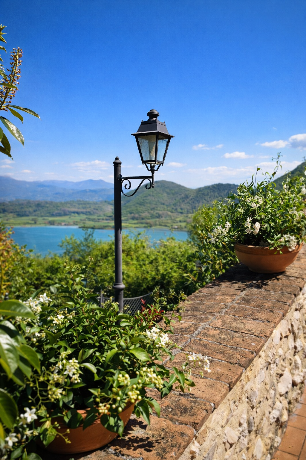 Lamppost and jasmine on the terrace overlooking Lake Canterno